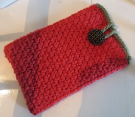 There is only one row of single crochet around the top of this one. It looks much better with two. Trust.